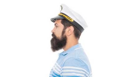 Bearded man profile portrait. Serious man wearing captain hat. Man profile face with beard and moustache isolated on white.