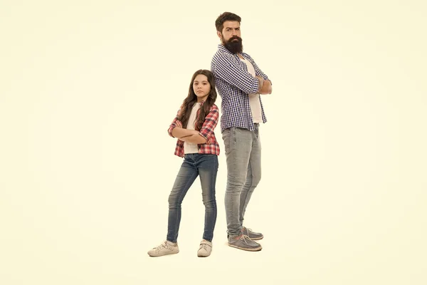 We are team. Bearded father and small girl stand back to back. My father is superhero. Being brave hero for small daughter. Support and defence. Little child and hipster father on white background.