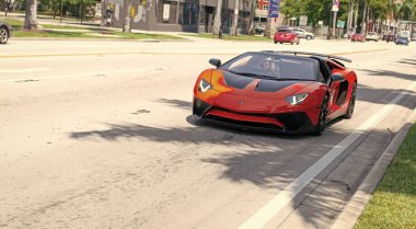 Miami Beach, Florida USA - April 15, 2021: red Lamborghini Aventador LP 750-4 SV, front view.