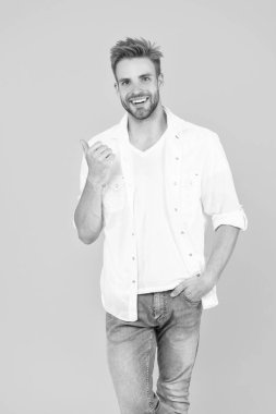 handsome man with stubble isolated on yellow. handsome man with stubble in studio. handsome man with stubble on background. photo of handsome man with stubble hair.