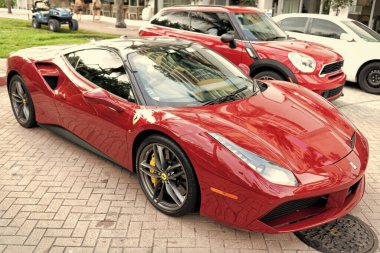 Miami Beach, Florida USA - April 18, 2021: red Ferrari 488 GTB, corner view.