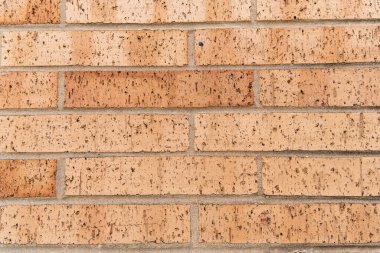 Malzeme konsepti. Tuğla duvarın yüzeyi. Kalıplaşmış kahverengi fon. Duvar dokusu arka planı. Tuğla duvar yapısı. Tuğla ustalığı. Tuğla döşe.