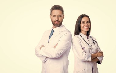 cardiologist doctor and nurse wear white coat, copy space. doctor cardiologist and nurse with stethoscope. cardiologist doctor and nurse isolated on white. cardiologist doctor and nurse in studio.