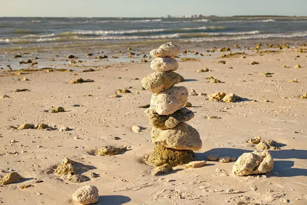 nature balance concept. zen like summer. stone pyramid sea. summer nature with pebble. life equilibrium. balance and harmony in life. harmony and balance. zen pebble at beach. symbol of tranquility.