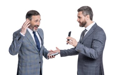 İş adamları telefonda görüşüyor. İşadamları beyazlara göre izole iş yapıyor. Reyting. İşadamları faiz oranlarını kontrol ediyor. Enflasyon oranı.
