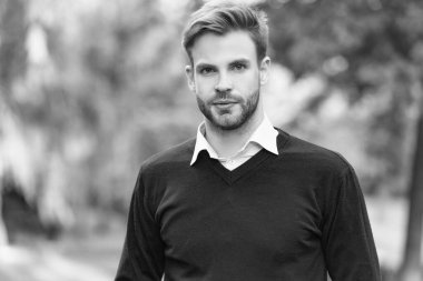 face of young handsome man in casual style outdoor.