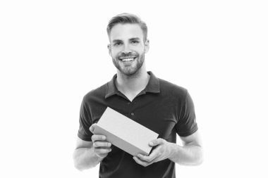 Happy man holding cardboard box. Delivery man isolated on white. Package delivery. Courier service. Parcel delivery, copy space.