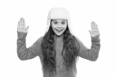 fur earflap hat fashion. happy little girl loves winter. finally winter holidays. enjoy christmas vacation. good mood in any weather. warm apparel for cold weather. childhood happiness and joy.