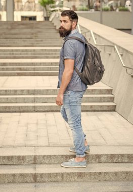 bearded man tourist with backpack. tourist with beard. caucasian tourist outdoor.