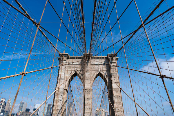 Brooklyn bridge in New York. Architecture of historic bridge in Brooklyn. Brooklyn bridge of New York city. New York bridge connecting Manhattan and Brooklyn. New York city architecture.