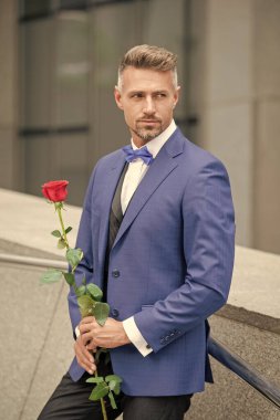 proposal concept. mature tuxedo man preparing for a proposal. man before marriage proposal.