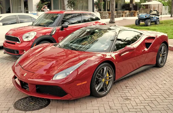 Miami Beach, Florida USA - April 18, 2021: red Ferrari 488 GTB sportcar, corner view.