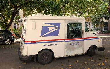 Miami Beach, Florida USA - March 23, 2021: usps postal sevice truck.