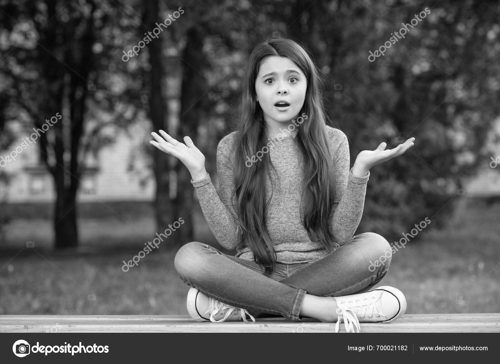 Shocked Teenage Girl Shrugging Shoulders Sitting Legs Crossed Bench ...