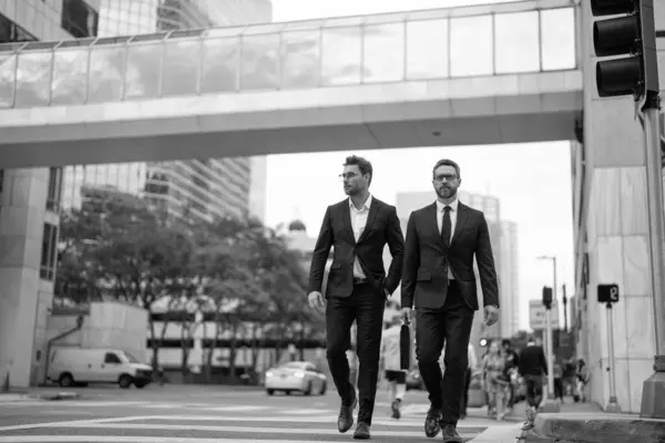 photo of two successful business leader boss, banner. successful business leader boss men. successful business leader boss in suit. successful business leader boss outdoor.
