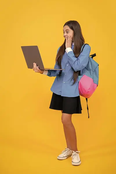 online education for surprised school girl. back to school. teen girl has lesson online. home schooling remote education. high school education. girl studying through elearning. Accessible education.