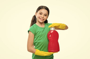 smiling girl cleaner with detergent on background. photo of girl cleaner with detergent. girl cleaner with detergent isolated on white. girl cleaner with detergent in studio.