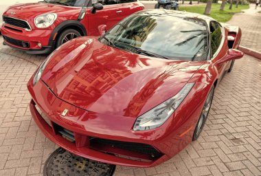 Miami Beach, Florida USA - April 18, 2021: red Ferrari 488 GTB, high view.