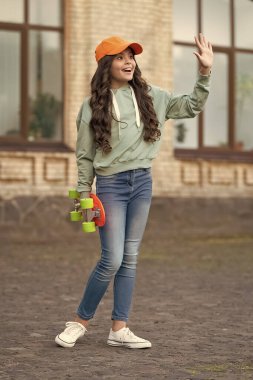 teen girl with skateboard outside, hello. teen girl with skateboard at the street. photo of teen girl with skateboard, skateboarding. teen girl with skateboard outdoor. clipart