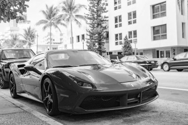 Miami Beach, Florida USA - April 18, 2021: parked red Ferrari 488 GTB sportcar, corner view.