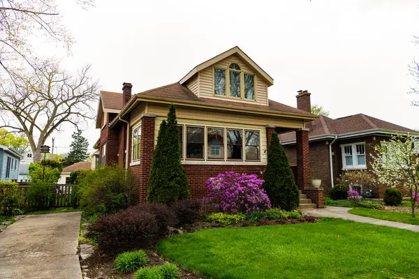 stock image Architecture of suburban neighborhood. cottage house in american neighborhood. suburban house property. property insurance. residential house in america neighborhood. Landscape architecture.