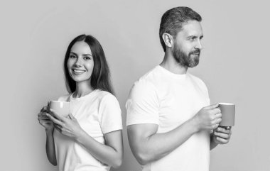 Happy couple enjoying coffee in morning. Couple of man and woman drinking morning coffee. Morning drink. Good morning.