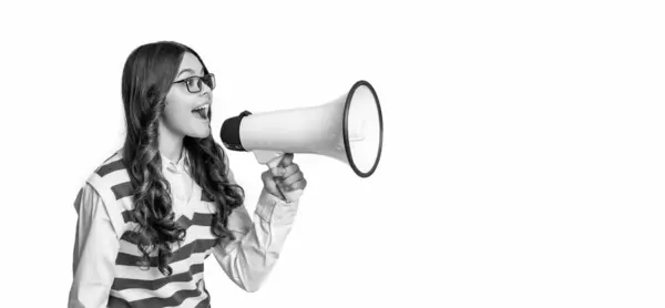 stock image photo of teen girl announcer with megaphone, advertisement. teen girl announcer isolated on white. teen girl announcer in studio. teen girl announcer on background.