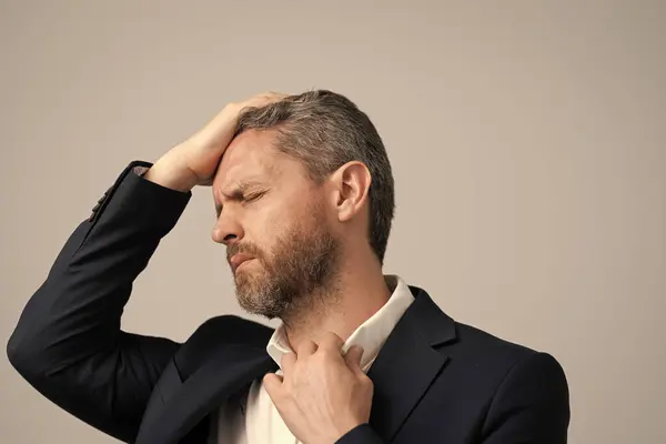 stock image Head pain migraine. Business man in suit with migraine. Business man got migraine touches her head because of pain. Tired exhausted man suffering from headache. Business problems. cephalalgia.