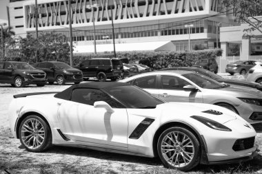 Miami Beach, Florida USA - April 15, 2021: white corvette stingray 2016 coupe z51 2lt, corner view.