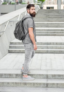 bearded man tourist with backpack. tourist with beard. caucasian tourist outdoor.