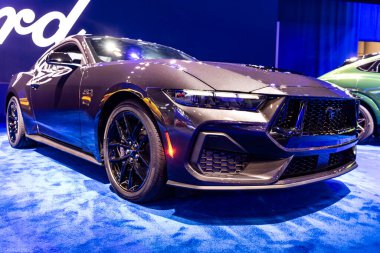 New York City, USA - March 27, 2024: 2024 Ford Mustang Mach 1 sportscar luxury car at New York International Auto Show, corner view. clipart