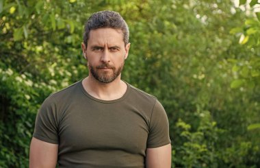 bearded man in shirt. caucasian man with beard. mature man outdoor. copy space.