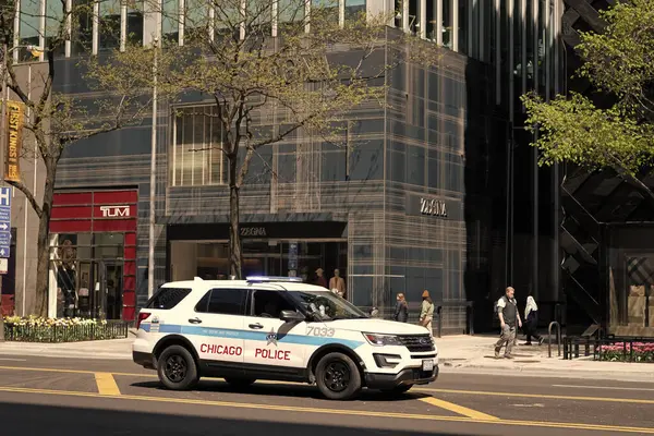 stock image Chicago, USA - April 27, 2023: Law enforcement agency Chicago Police department car on the road, side view.