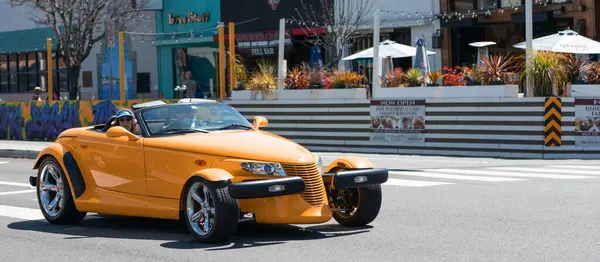 stock image Long Beach, California USA - March 31, 2021: classic car of yellow Chrysler Plymouth Prowler. copy space.