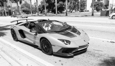 Miami Beach, Florida USA - April 15, 2021: orange Lamborghini Aventador LP 750-4 SV, corner view.
