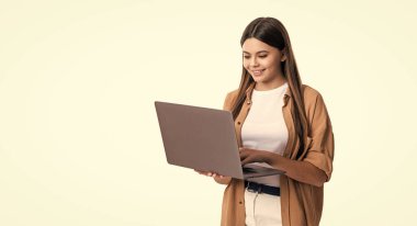 school girl use laptop for education, copy space. teen girl with pc for school education in studio. school education for girl. teen school girl has education with laptop isolated on white background.