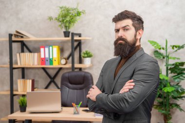 serious bearded businessman wear suit crossed hands in the office with copy space, formalwear.