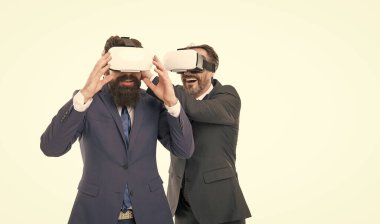 Virtual work. Digital future and innovation. modern technology in agile business. mature men with beard in formal suit. virtual reality. Partnership and teamwork. businessmen wear wireless VR glasses.