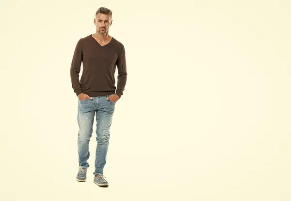 stock image Man wearing casual menswear isolated on white advertisement. mature man with trendy menswear for everyday life. handsome man in casual menswear in studio. well looking man in casual style menswear.