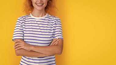 cropped view of redhead woman isolated on yellow background. young redhead woman in studio. adult redhead woman.
