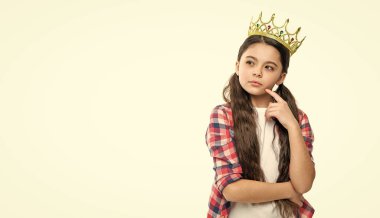 teen egoist girl isolated on white. teen egoist girl in studio. teen egoist girl on background. photo of teen egoist girl wear crown.