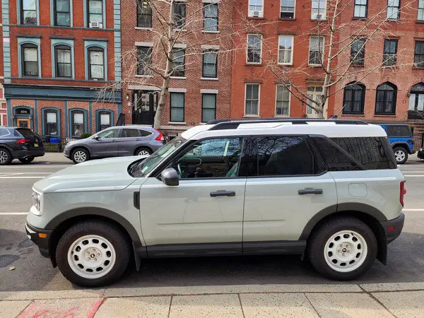 stock image New York City, USA - February 27, 2024: 2023 Ford Bronco Sport Heritage modern car parked outdoor, side view.