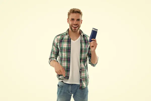 stock image photo of happy man with haircare cosmetics. man with haircare cosmetics isolated on white. man with haircare cosmetics on background. man with haircare cosmetics in studio.