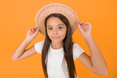 Summer vacation outfit. Ready to relax. Teen girl summer fashion. Little beauty in straw hat. Beach style for kids. Visit tropical islands. Turn back brim straw hat. Happy kid relaxing summer resort.