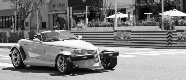 Stock image Long Beach, California USA - March 31, 2021: classic car of yellow Chrysler Plymouth Prowler. copy space.