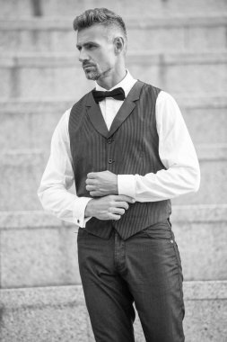 elegant man in suit. grizzled man in formalwear. tux man bridegroom.