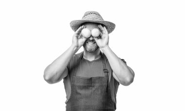 greengrocer in apron and hat with mushroom vegetable isolated on white.