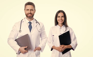 hapy doctor with internist in studio. photo of doctor and internist wear white coat. internist and doctor with laptop and anamnesis. doctor and internist isolated on white background. clipart