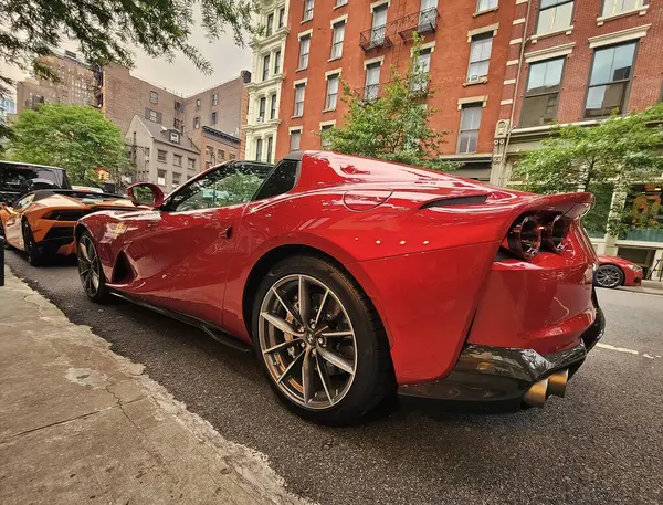 stock image New York City, USA - June 03, 2023: Ferrari 812 GTS Superfast convertible red parked rear passenger side wheel.