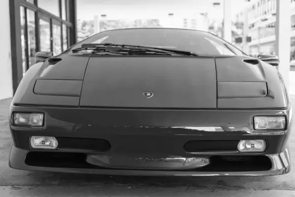 Stock image Miami Beach, Florida USA - April 15, 2021: red Lamborghini diablo, front view low angle. luxury sport car.